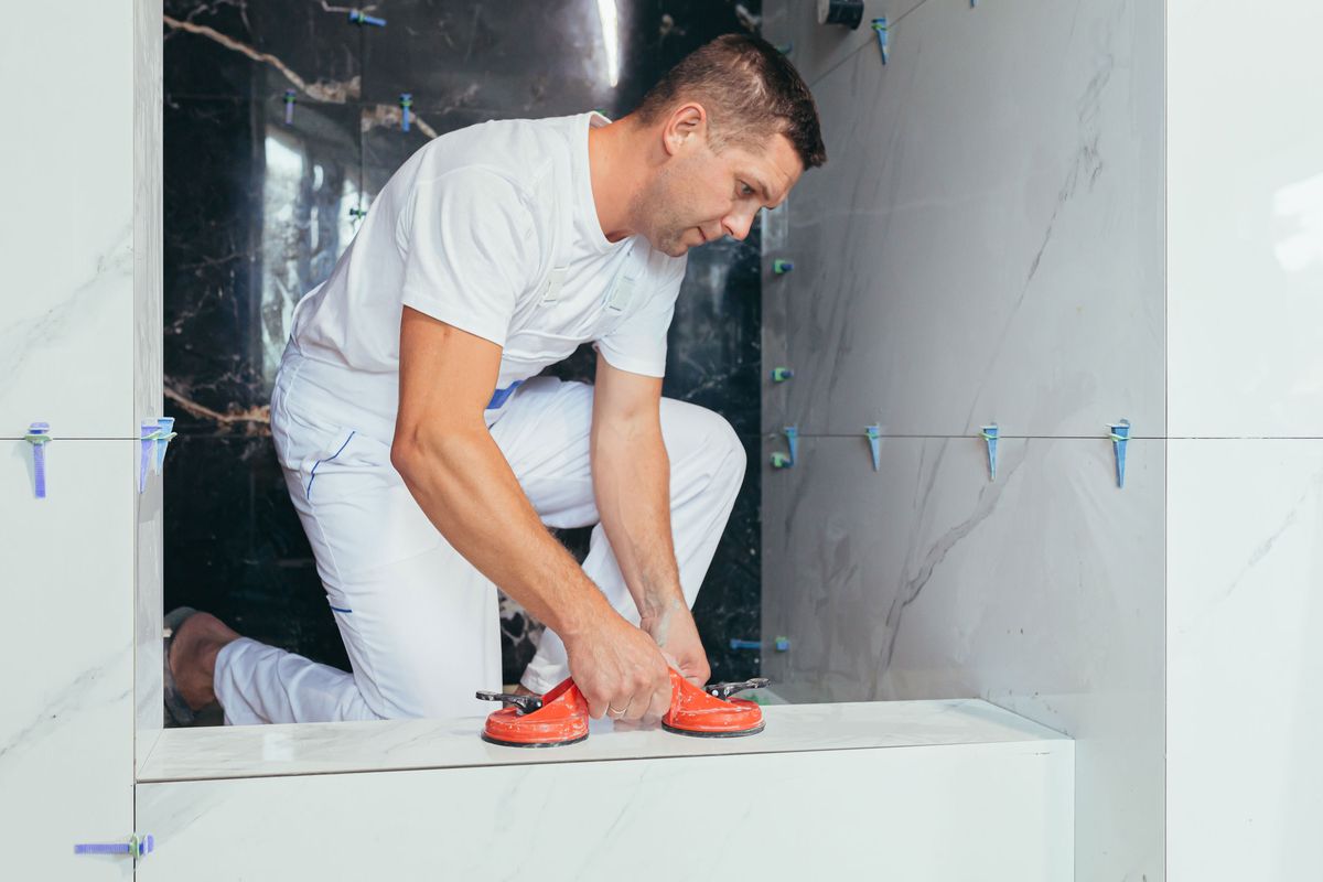 Tiler on the job