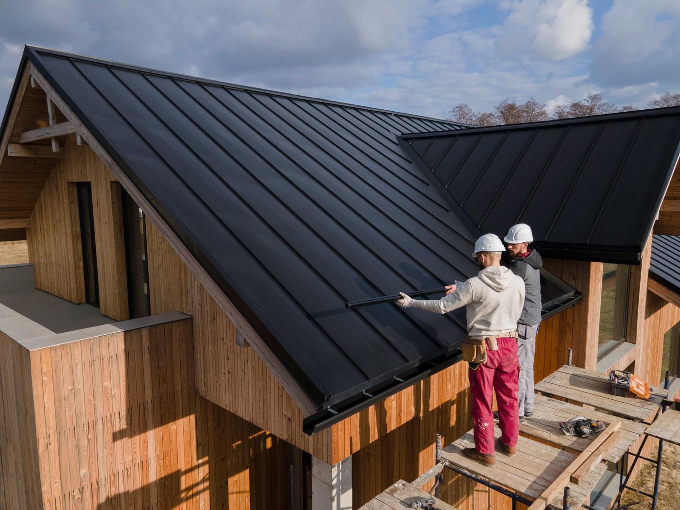 Roofers working together